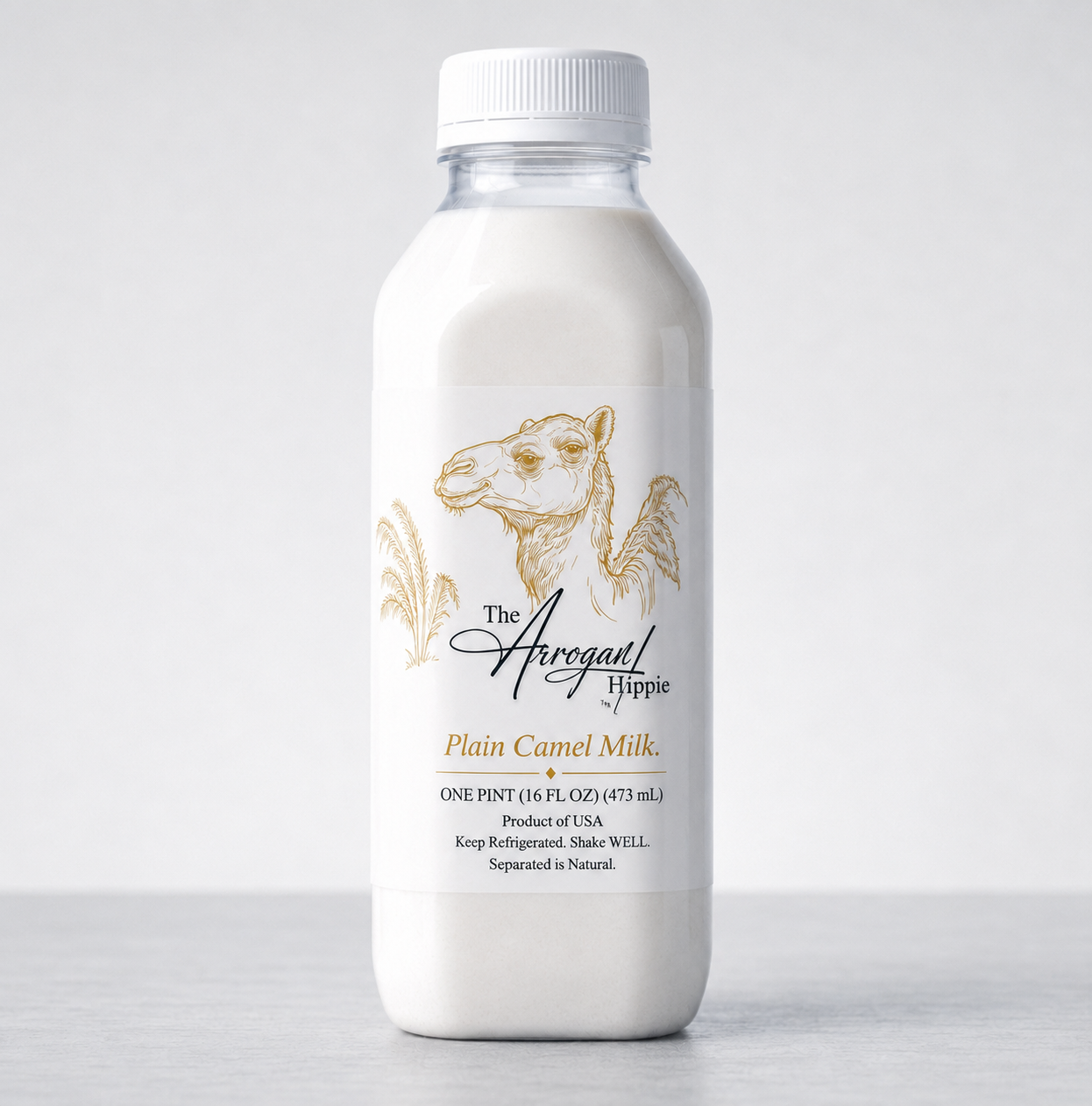 The Arrogant Hippie pasteurized camel milk pint bottle, front view